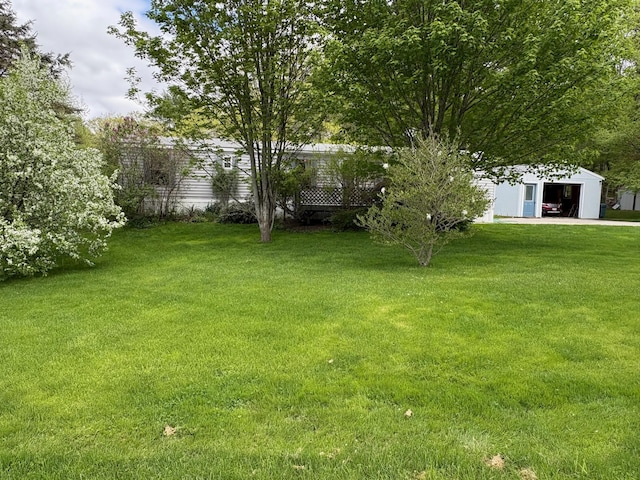 1236 Waldo Station Rd, Waldo, ME 04915 - view of grassy yard with an outbuilding