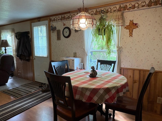 1236 Waldo Station Rd, Waldo, ME 04915 - dining room with wallpapered walls, wood finished floors, and wainscoting