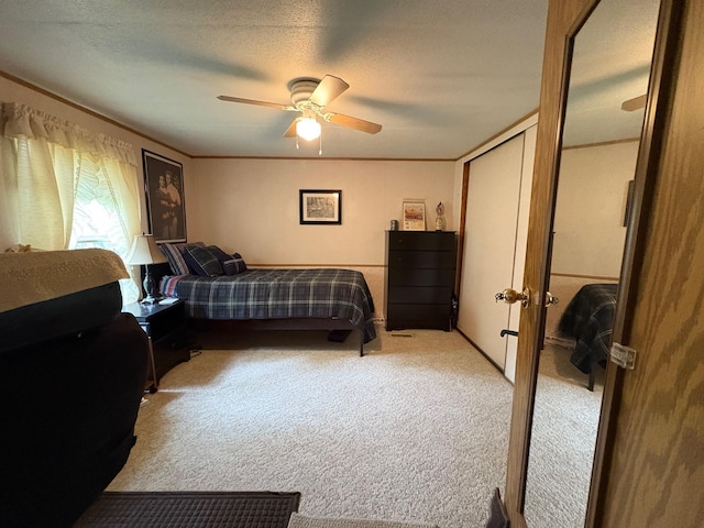 1236 Waldo Station Rd, Waldo, ME 04915 - bedroom featuring carpet flooring, french doors, a ceiling fan, a textured ceiling, and a closet