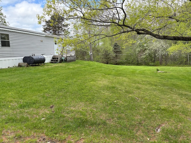 1236 Waldo Station Rd, Waldo, ME 04915 - view of grassy yard with oil tank