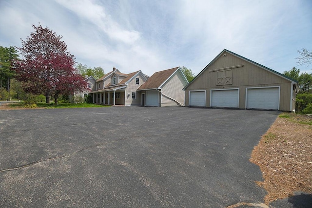 84 Little River Rd, Berwick, ME 03901 - view of front of home with a garage and an outbuilding