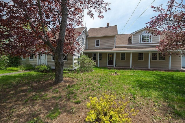 84 Little River Rd, Berwick, ME 03901 - view of front facade with a front yard and a porch