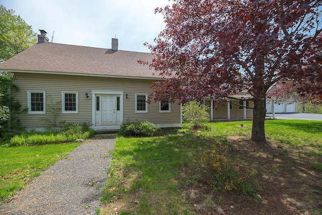 84 Little River Rd, Berwick, ME 03901 - view of front of home featuring a chimney, a front yard, and a shingled roof