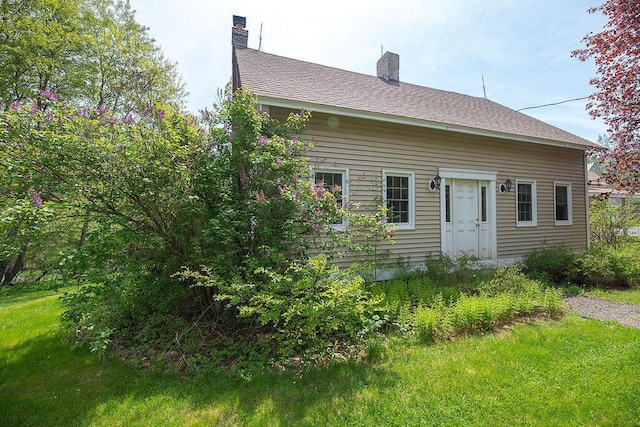 84 Little River Rd, Berwick, ME 03901 - view of front of property with a chimney and a front yard