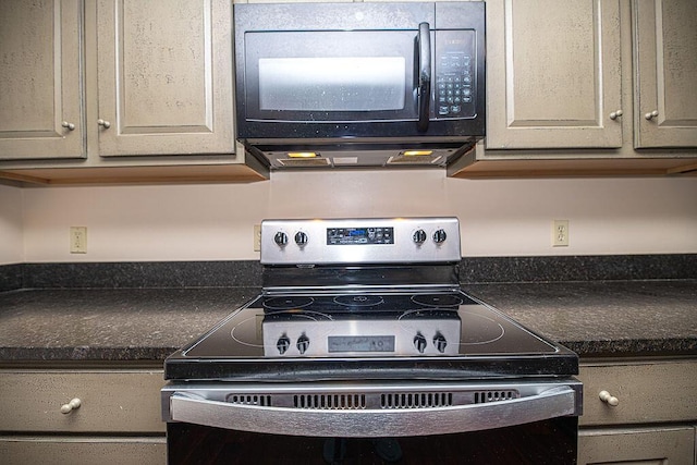 84 Little River Rd, Berwick, ME 03901 - kitchen view of black microwave, electric range, dark countertops, and ventilation hood