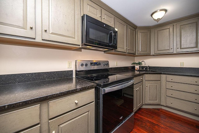 84 Little River Rd, Berwick, ME 03901 - kitchen featuring black microwave, stainless steel electric stove, dark countertops, gray cabinetry, and dark wood-type flooring