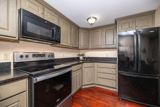 84 Little River Rd, Berwick, ME 03901 - kitchen featuring black appliances, dark countertops, dark wood-style flooring, and a sink