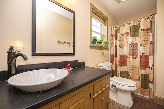 84 Little River Rd, Berwick, ME 03901 - bathroom with vanity, toilet, and curtained shower