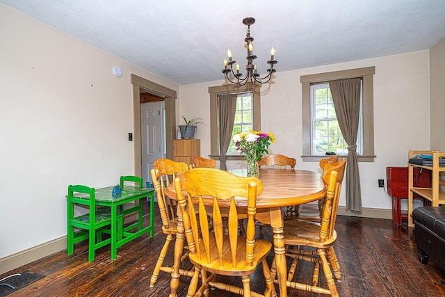 84 Little River Rd, Berwick, ME 03901 - dining room with a chandelier, hardwood / wood-style flooring, baseboards, and a textured ceiling