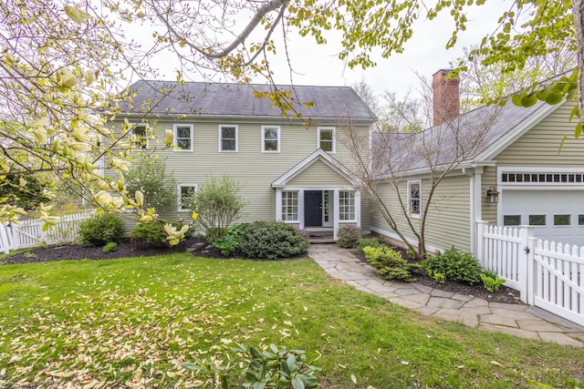 17 Spruce St, Rockport, ME 04856 - colonial house with a chimney and a garage