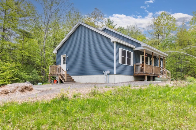 80 Hubbard Rd, Berwick, ME 03901 - view of home's exterior featuring covered porch and stairway