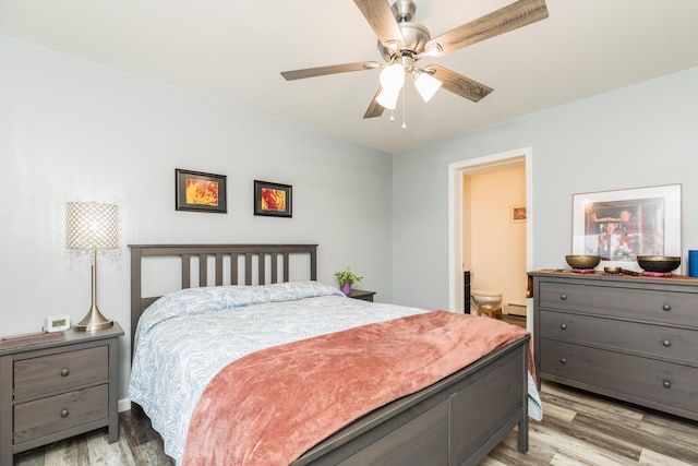 80 Hubbard Rd, Berwick, ME 03901 - bedroom with light wood finished floors, a baseboard heating unit, ensuite bath, and ceiling fan