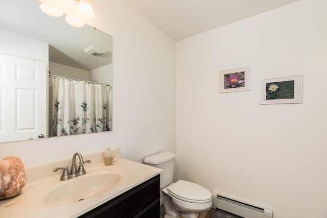 80 Hubbard Rd, Berwick, ME 03901 - bathroom featuring a baseboard heating unit, vanity, and toilet