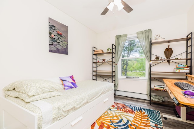 80 Hubbard Rd, Berwick, ME 03901 - bedroom featuring wood finished floors, a baseboard heating unit, and ceiling fan