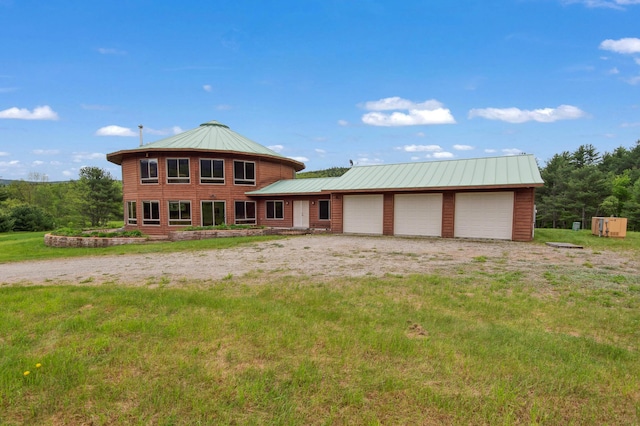 2222 Main Rd, Chatham, NH 03813 - view of front of property with a garage and metal roof