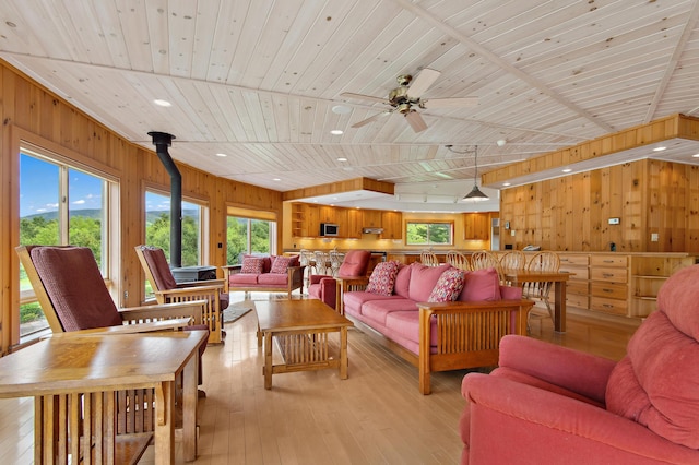 2222 Main Rd, Chatham, NH 03813 - living area featuring wood walls, light wood-style floors, a ceiling fan, wood ceiling, and recessed lighting