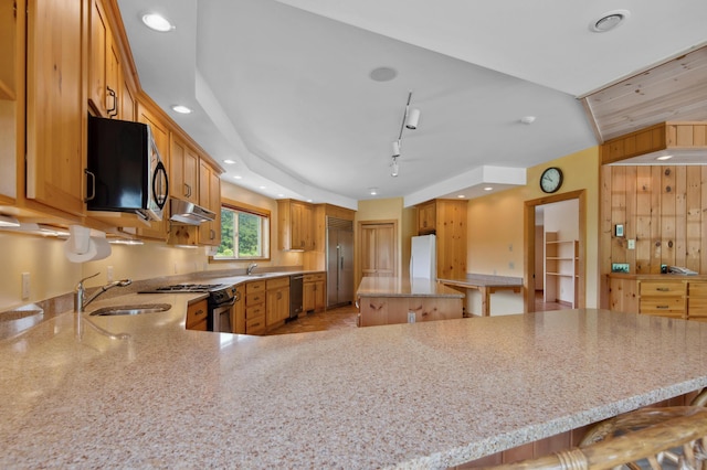 2222 Main Rd, Chatham, NH 03813 - kitchen featuring stainless steel appliances, a sink, light stone counters, a center island, and recessed lighting