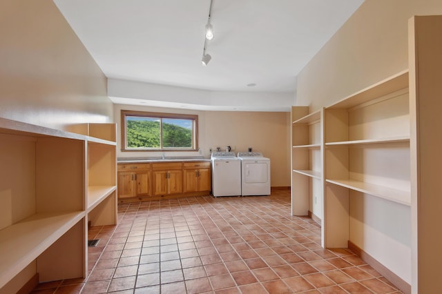 2222 Main Rd, Chatham, NH 03813 - washroom featuring cabinet space, independent washer and dryer, and track lighting