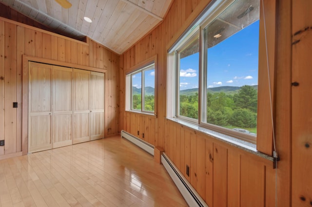 2222 Main Rd, Chatham, NH 03813 - unfurnished sunroom with vaulted ceiling and a baseboard radiator