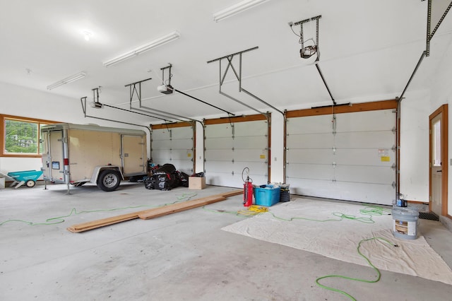 2222 Main Rd, Chatham, NH 03813 - garage featuring a garage door opener