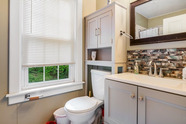 4 University Pl, Orono, ME 04473 - bathroom featuring toilet, vanity, and a shower with shower curtain