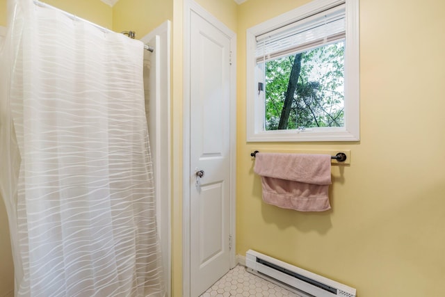 4 University Pl, Orono, ME 04473 - full bathroom with baseboard heating, baseboards, and curtained shower