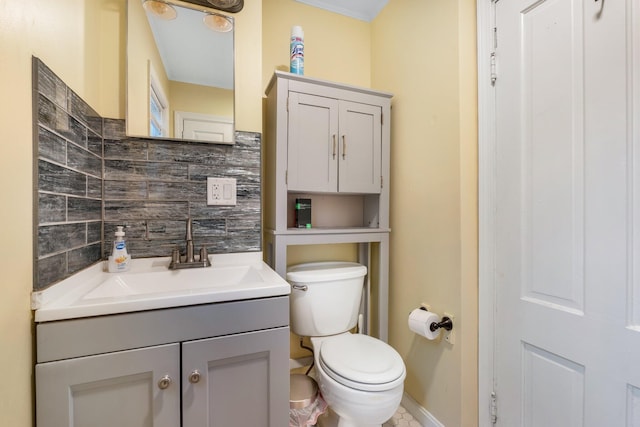 4 University Pl, Orono, ME 04473 - bathroom featuring vanity, toilet, and baseboards