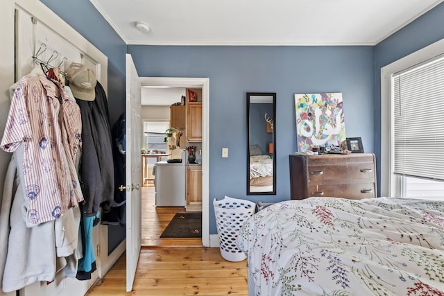 69 Stanford St, South Portland, ME 04106 - bedroom with light wood-style flooring and crown molding
