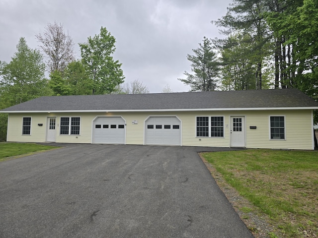 37 Bog Rd, Augusta, ME 04330 - ranch-style home with asphalt driveway, an attached garage, and a front lawn