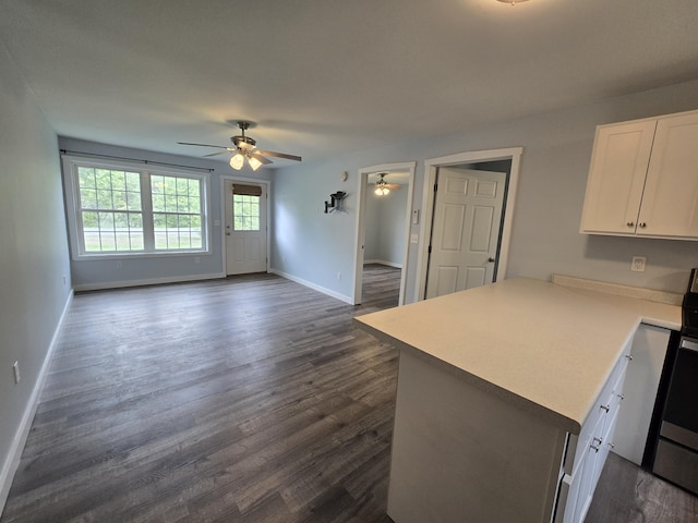 37 Bog Rd, Augusta, ME 04330 - kitchen featuring a ceiling fan, baseboards, white cabinetry, dark wood-type flooring, and light countertops