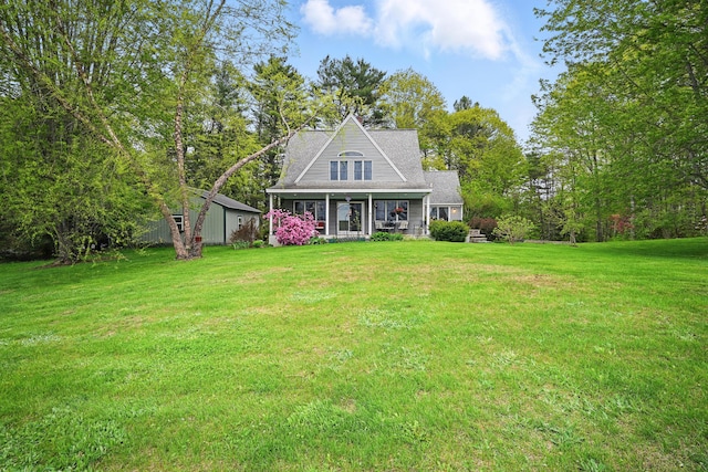 17 Lincoln Ln, Newcastle, ME 04553 - view of front of house featuring covered porch and a front yard