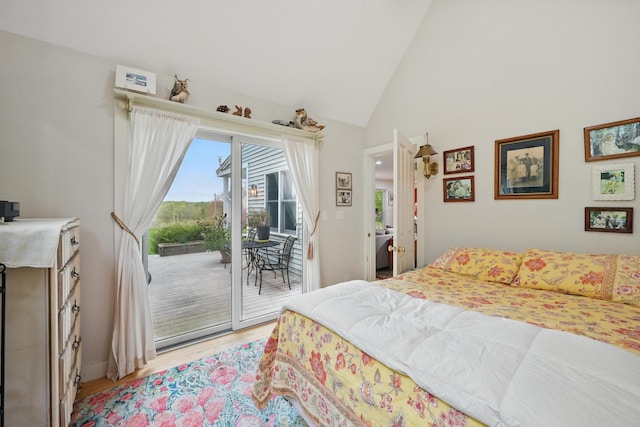17 Lincoln Ln, Newcastle, ME 04553 - bedroom with access to outside, light wood-type flooring, and high vaulted ceiling