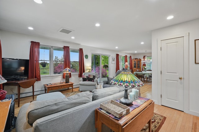 17 Lincoln Ln, Newcastle, ME 04553 - living area with baseboard heating, recessed lighting, and light wood finished floors
