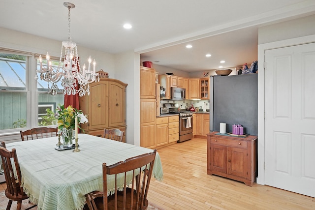 17 Lincoln Ln, Newcastle, ME 04553 - dining area with light wood-style floors, a chandelier, and recessed lighting