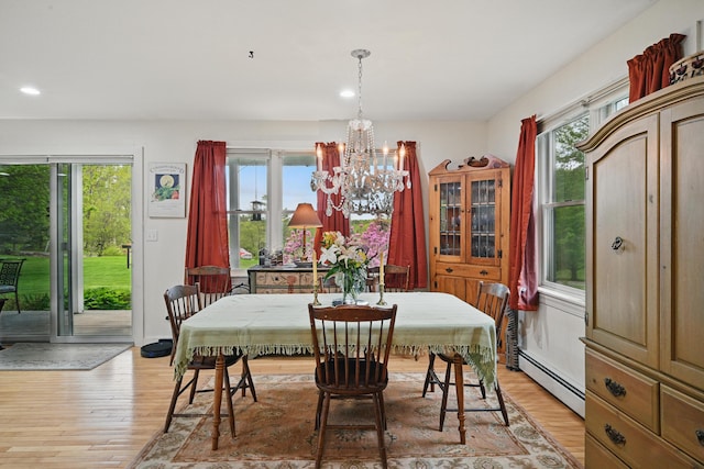 17 Lincoln Ln, Newcastle, ME 04553 - dining space featuring a baseboard radiator, a chandelier, light wood finished floors, and recessed lighting