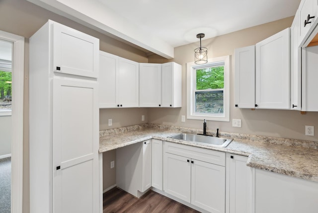 834-836 Sebago Rd, Sebago, ME 04029 - kitchen with a sink, healthy amount of natural light, wood finished floors, and white cabinetry