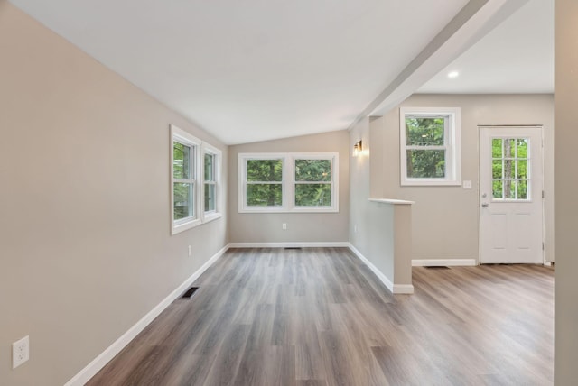 834-836 Sebago Rd, Sebago, ME 04029 - spare room featuring baseboards, wood finished floors, lofted ceiling, and recessed lighting