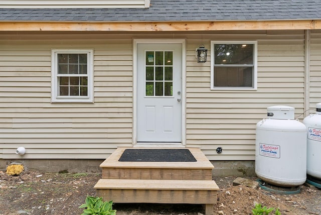 834-836 Sebago Rd, Sebago, ME 04029 - property entrance with a shingled roof