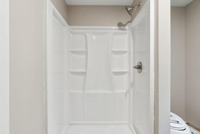 834-836 Sebago Rd, Sebago, ME 04029 - full bathroom featuring a shower stall and toilet