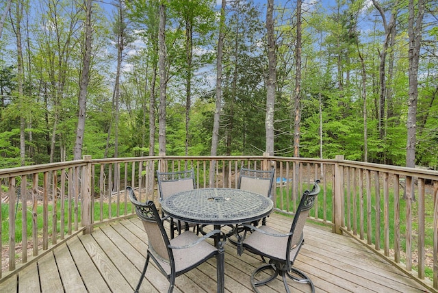 834-836 Sebago Rd, Sebago, ME 04029 - wooden deck with outdoor dining area