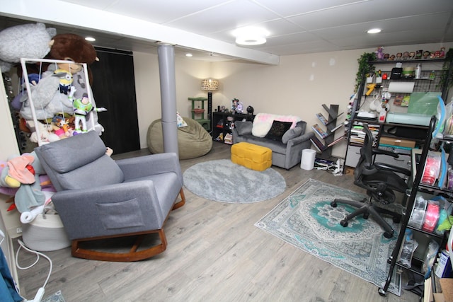 24 Mitchell St, Lewiston, ME 04240 - finished below grade area featuring wood finished floors and recessed lighting