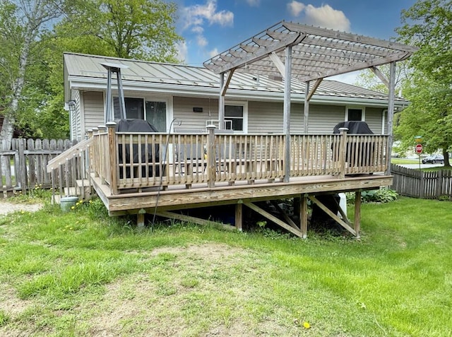 24 Mitchell St, Lewiston, ME 04240 - rear view of property with a deck, a pergola, a standing seam roof, and metal roof
