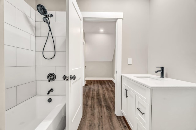 61 Main Rd, Eddington, ME 04428 - full bath featuring vanity, wood finished floors, bathtub / shower combination, and baseboards