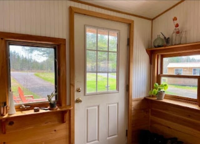 634 N Rd, Mount Chase, ME 04765 - doorway to outside featuring healthy amount of natural light and ornamental molding