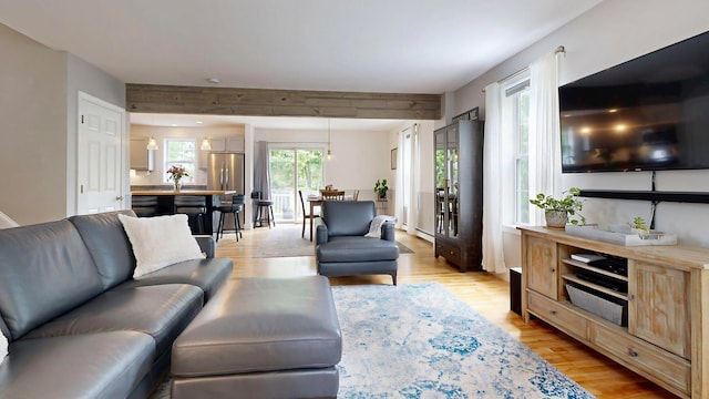 53 Gray Rd, Gorham, ME 04038 - living area with light wood-style flooring and baseboard heating