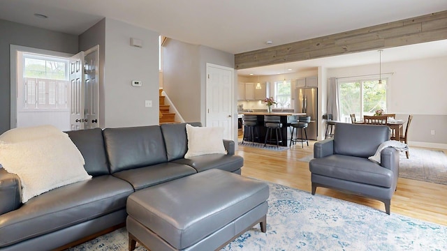 53 Gray Rd, Gorham, ME 04038 - living room with stairs and light wood finished floors