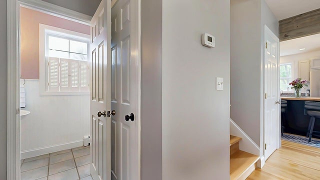 53 Gray Rd, Gorham, ME 04038 - corridor featuring a baseboard radiator and light tile patterned flooring