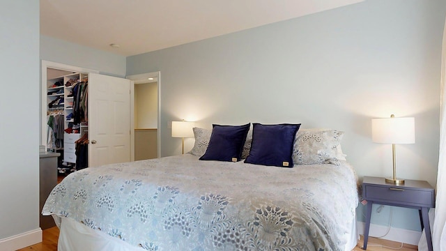 53 Gray Rd, Gorham, ME 04038 - bedroom featuring baseboards, a spacious closet, and a closet