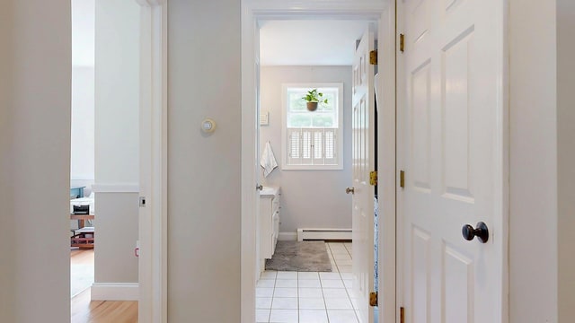 53 Gray Rd, Gorham, ME 04038 - bathroom with a baseboard heating unit, vanity, baseboards, and tile patterned floors