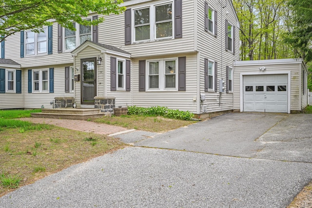 29 Emanual Dr, Brunswick, ME 04011 - view of front of house with a garage and asphalt driveway